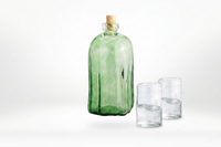 Kit Guelaguetza: Botella corteza verde + mezcaleros de regalo